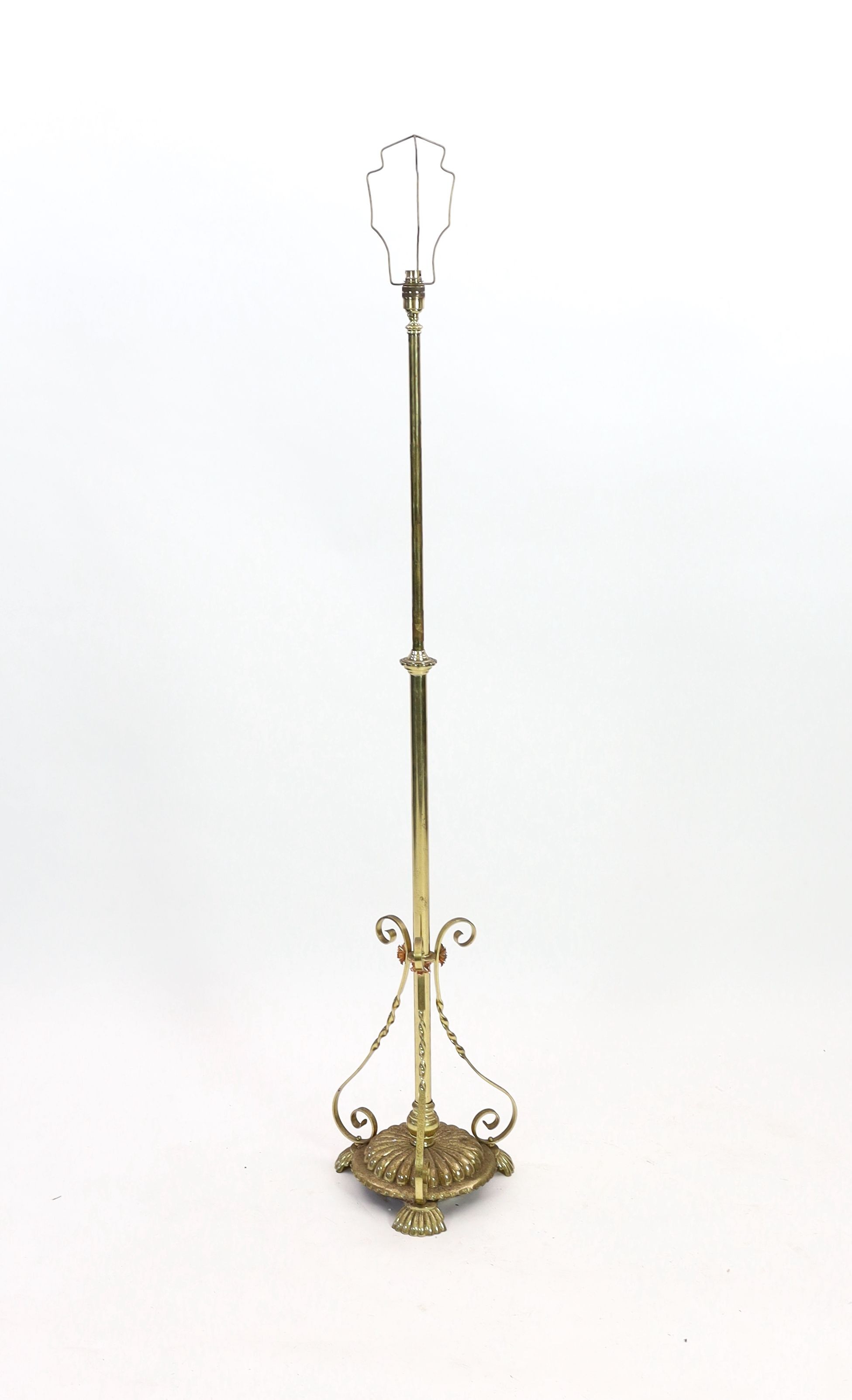 An Edwardian brass telescopic lamp standard